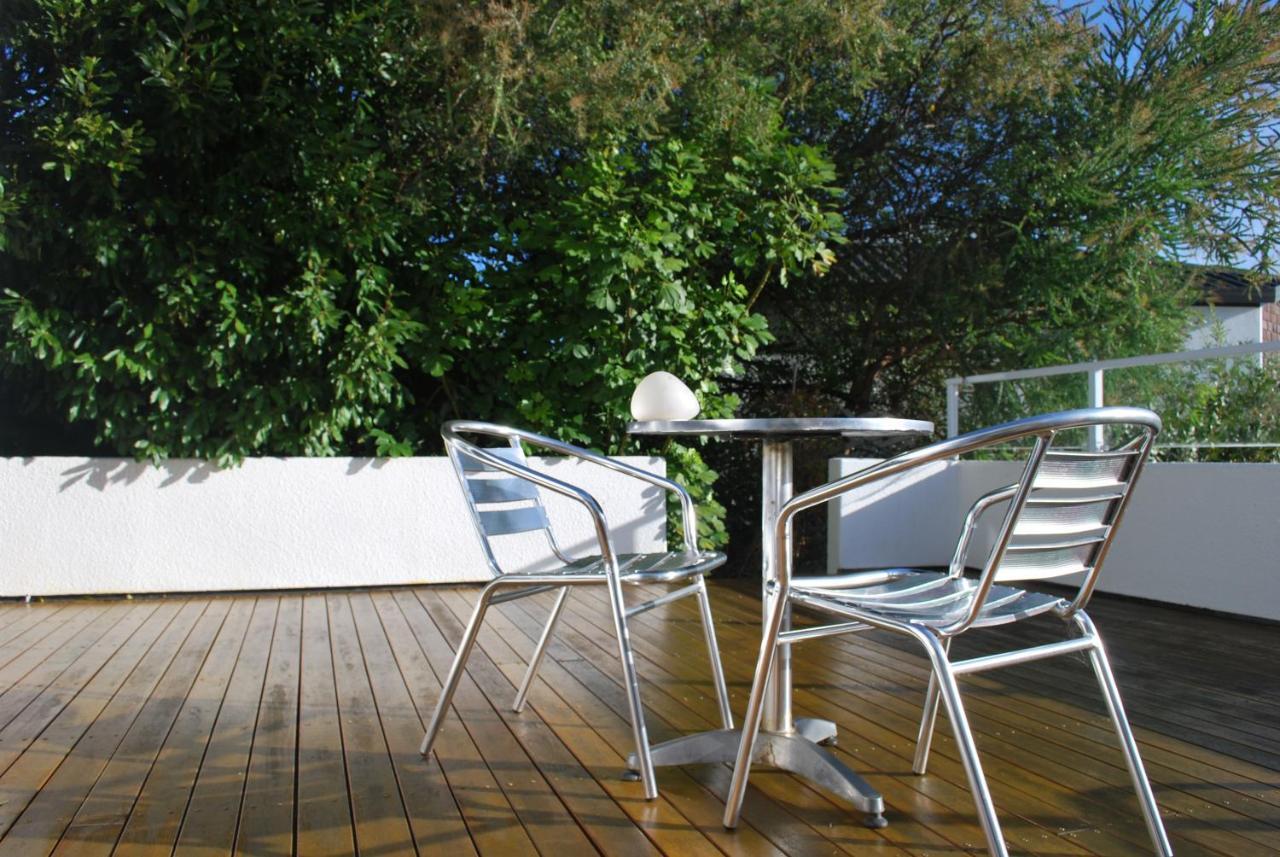Lodge Front:palms-on-the-beach.kaiteriteri. *