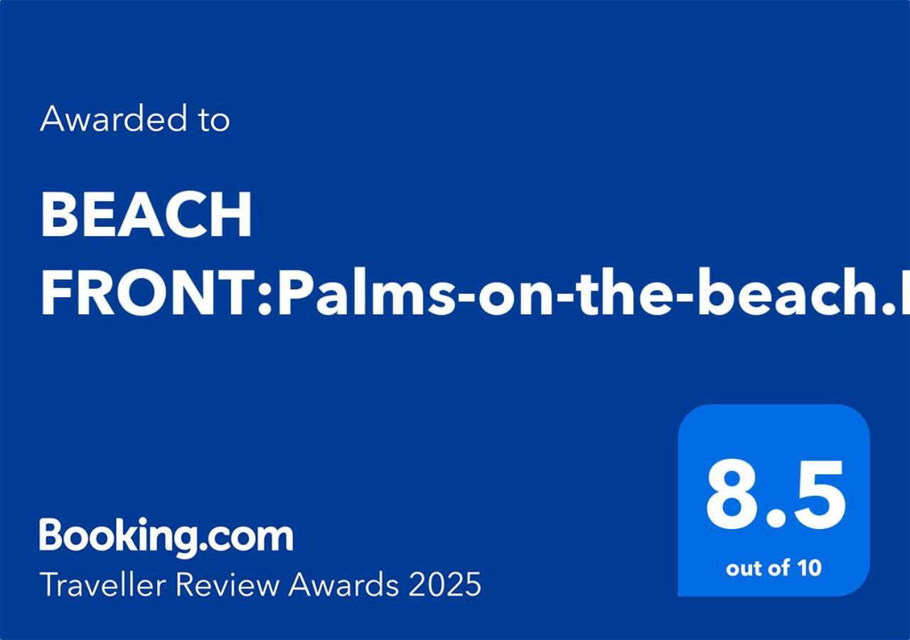 Lodge Front:palms-on-the-beach.kaiteriteri. Kaiteriteri